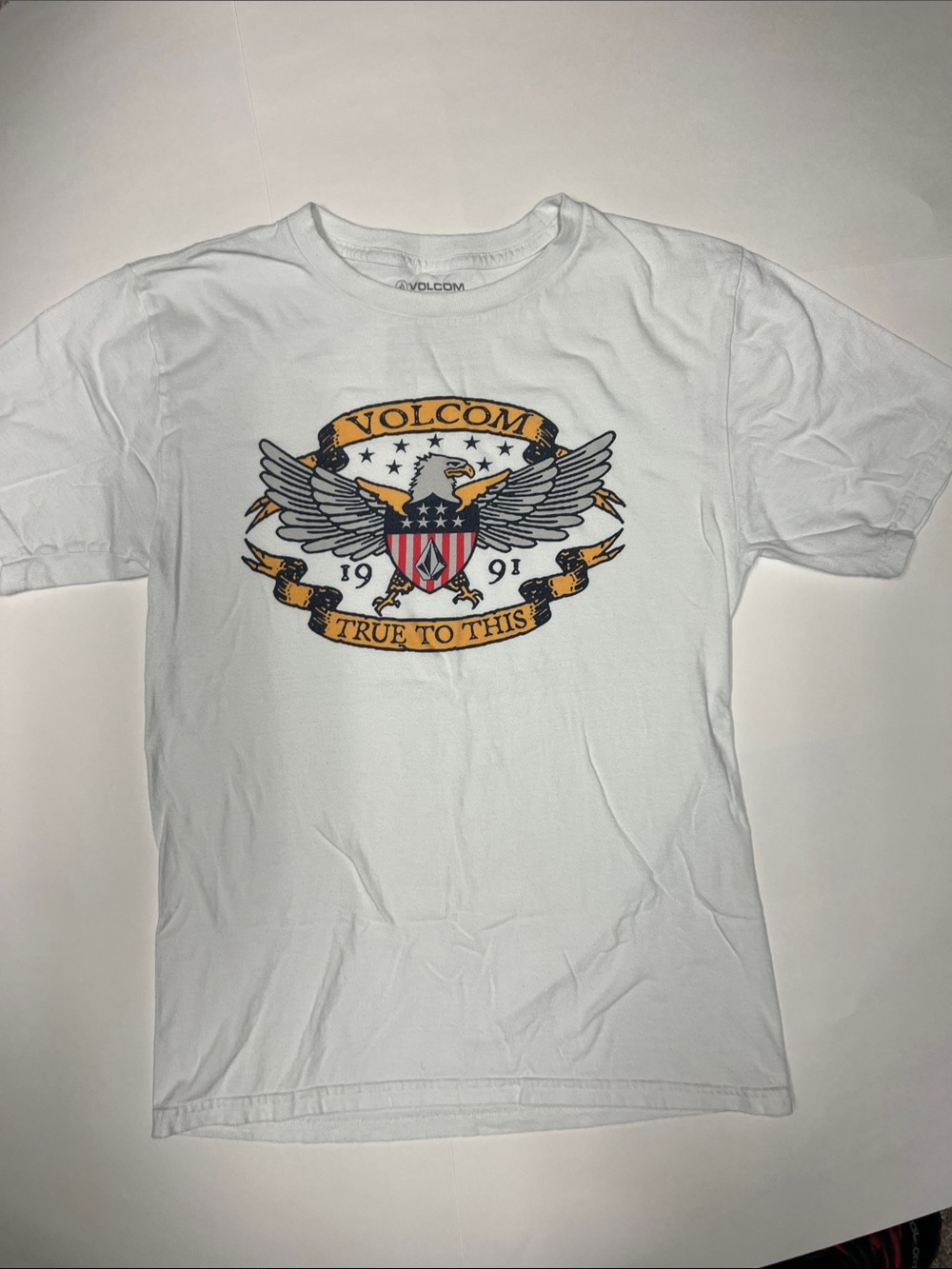 Volcom White Short Sleeve Eagle Shield Graphic Tee with Navy and Gold